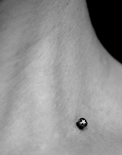 A piercing that is being 